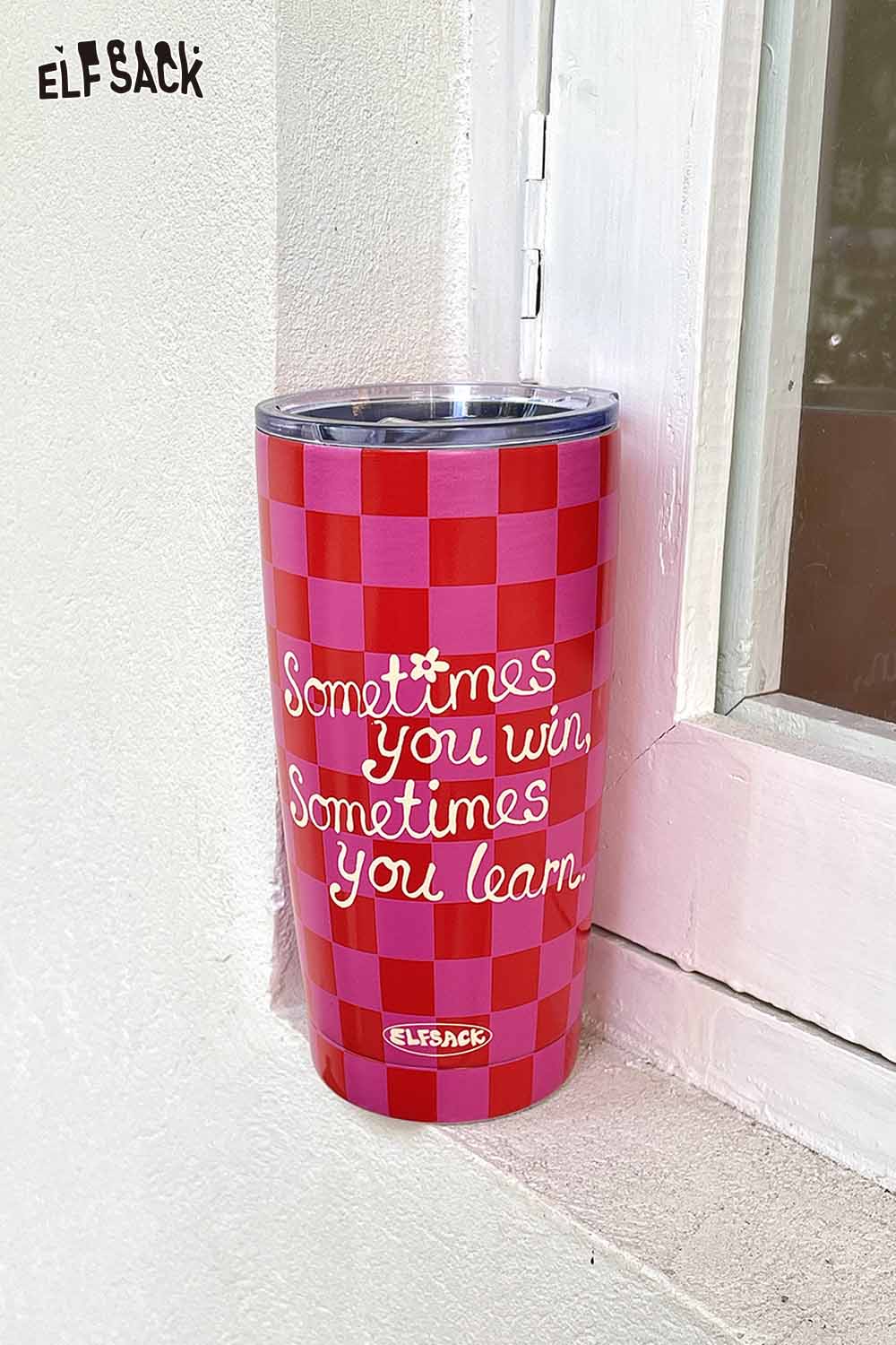 ELFSACK plaid stainless steel tumbler featuring a motivational quote near a window