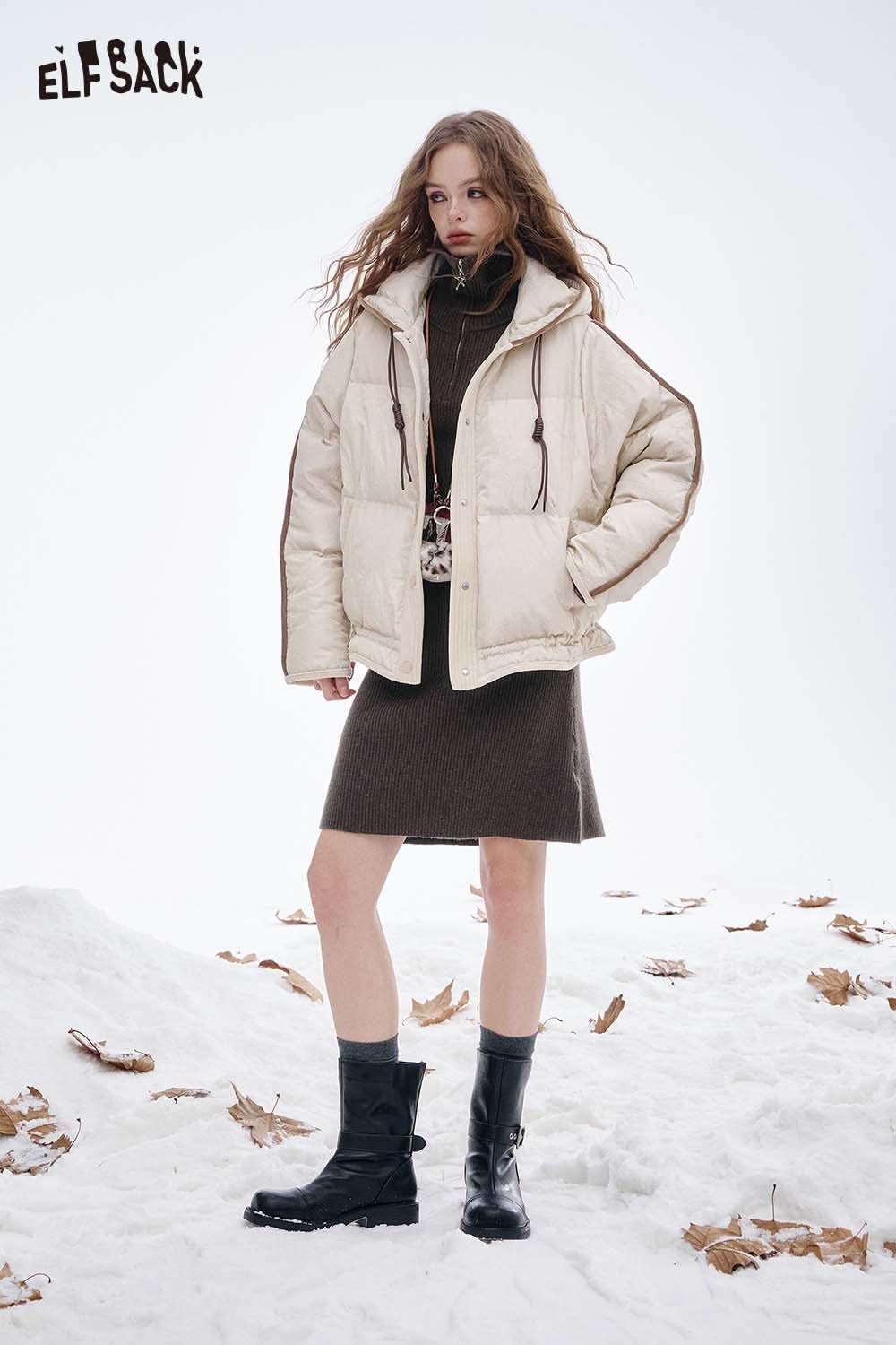 ELFSACK slim fit embroidered long dress styled with a warm puffer jacket against a snowy background