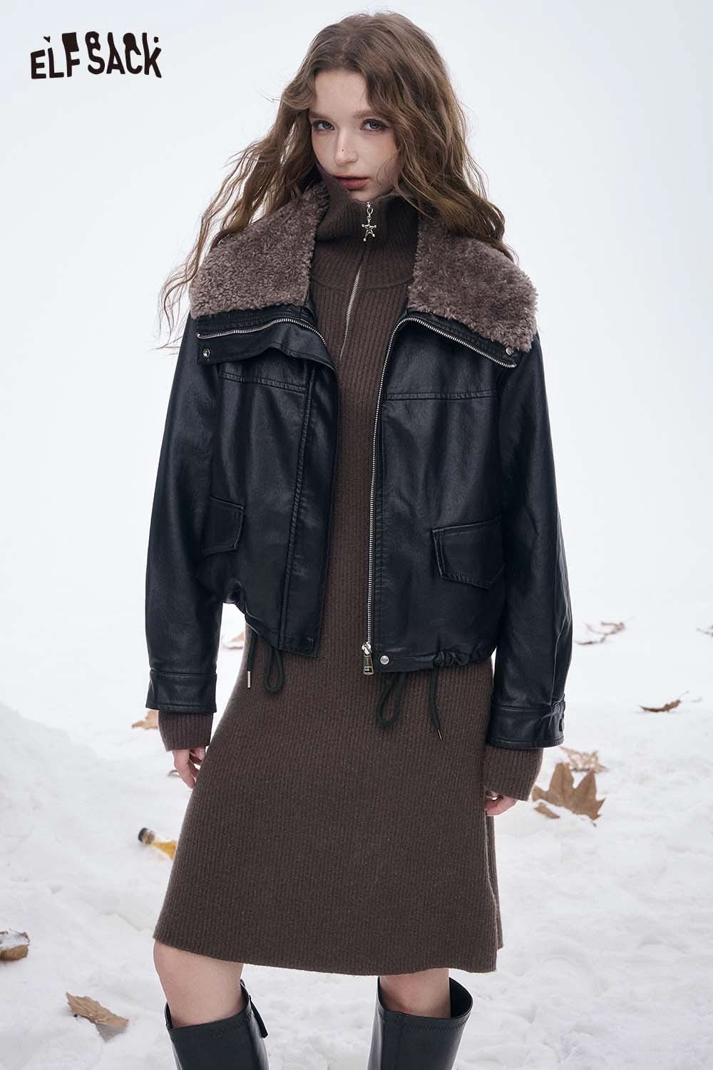 Model wearing a black leather jacket over a brown slim fit embroidered long dress for a trendy winter look