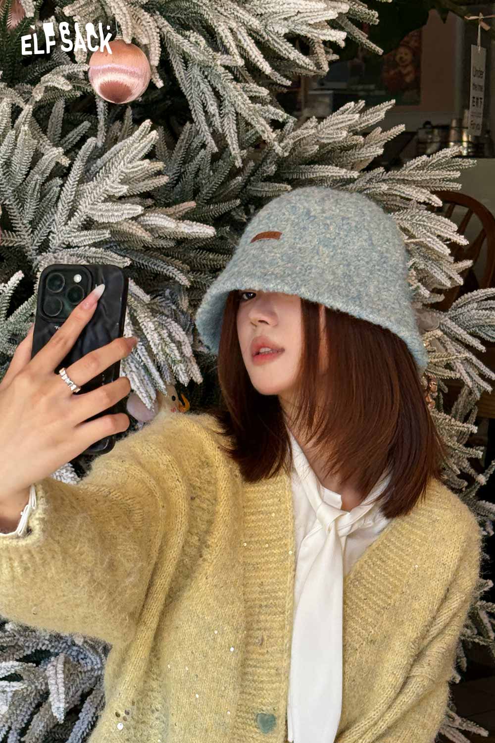ELFSACK soft wool knit bucket hat in blue, perfect for cozy fall fashion and stylish warmth