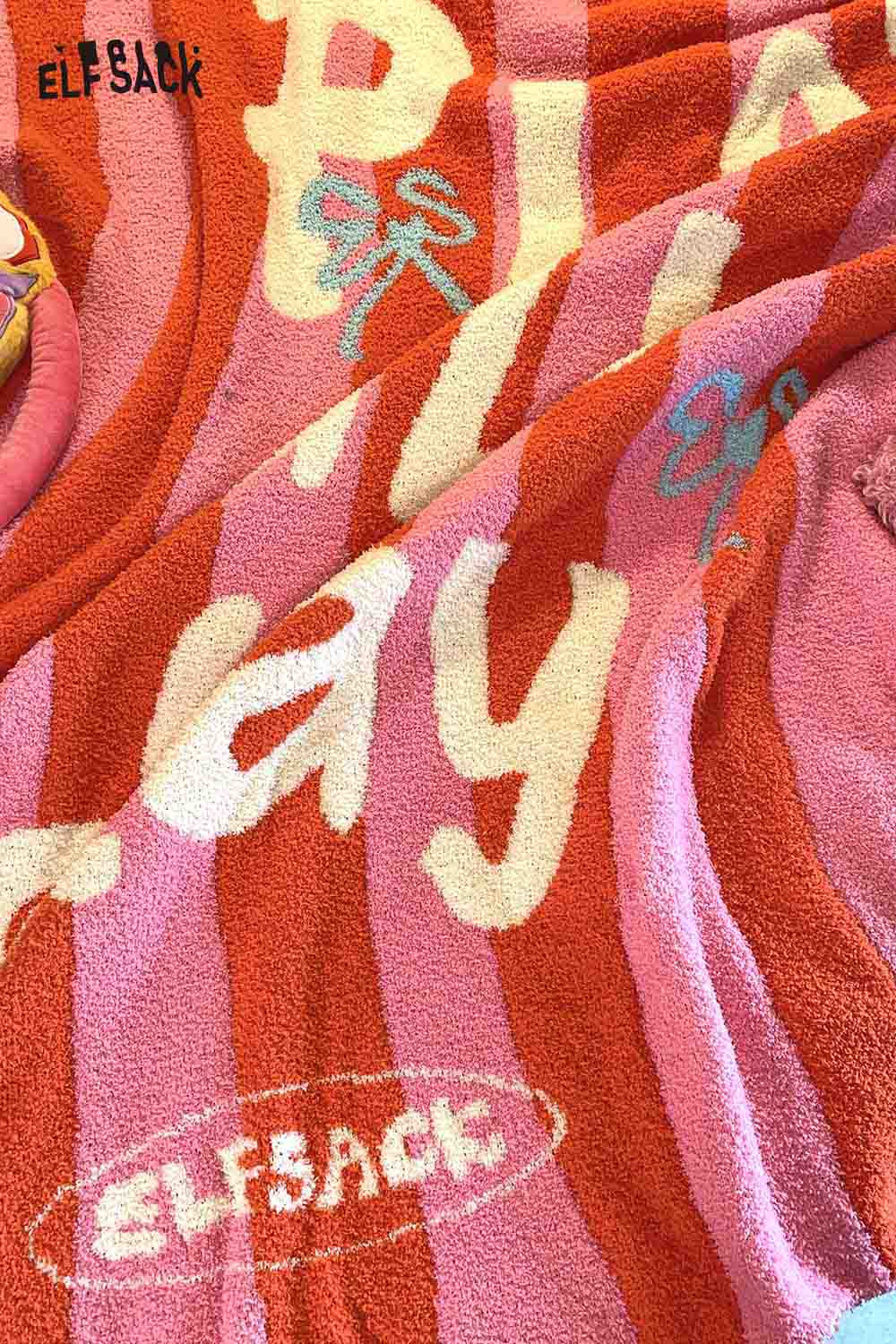 ELFSACK striped color block home blanket in vibrant colors with playful text design