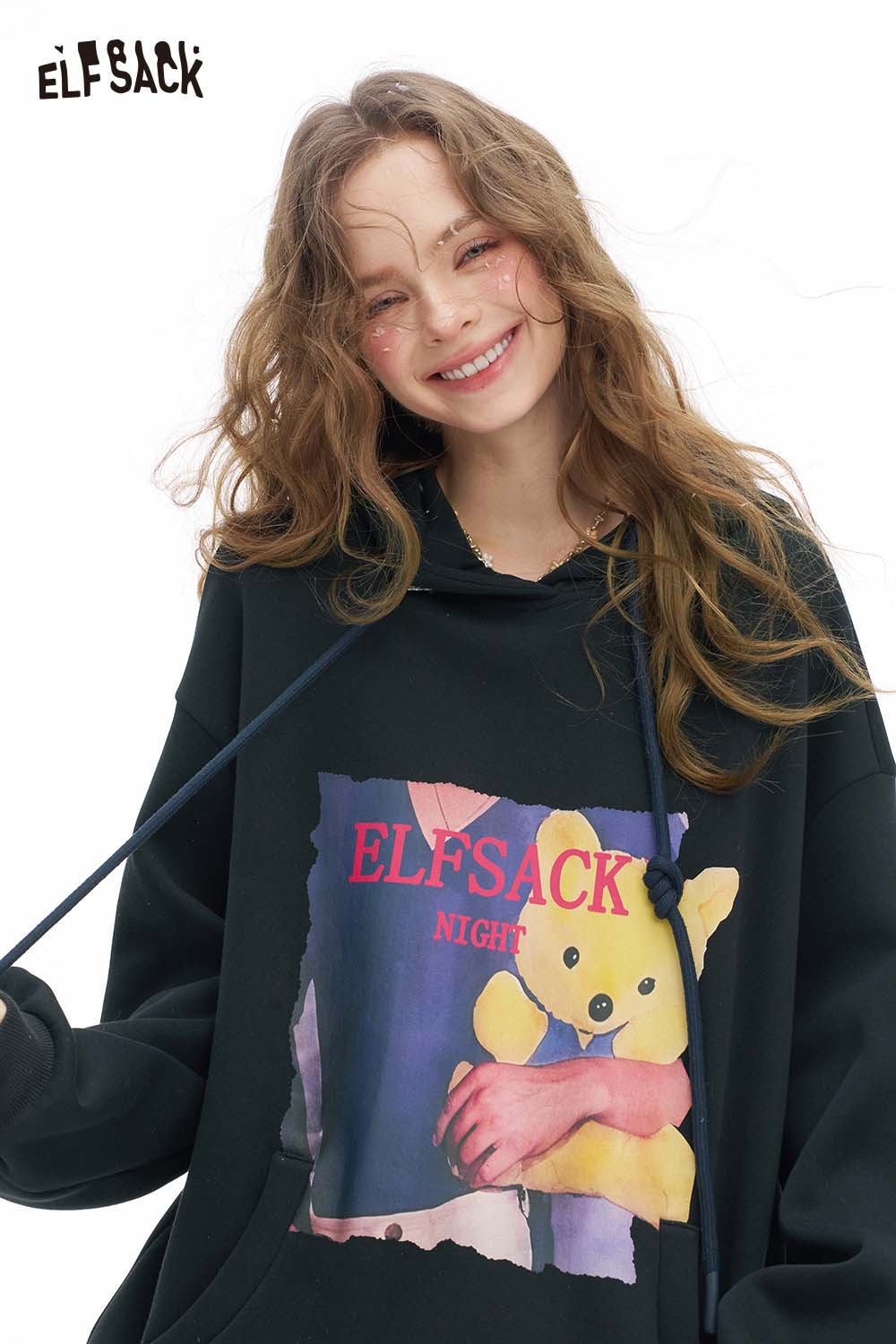 ELFSACK women's animal graphic hoodie featuring a colorful teddy bear design and oversized fit