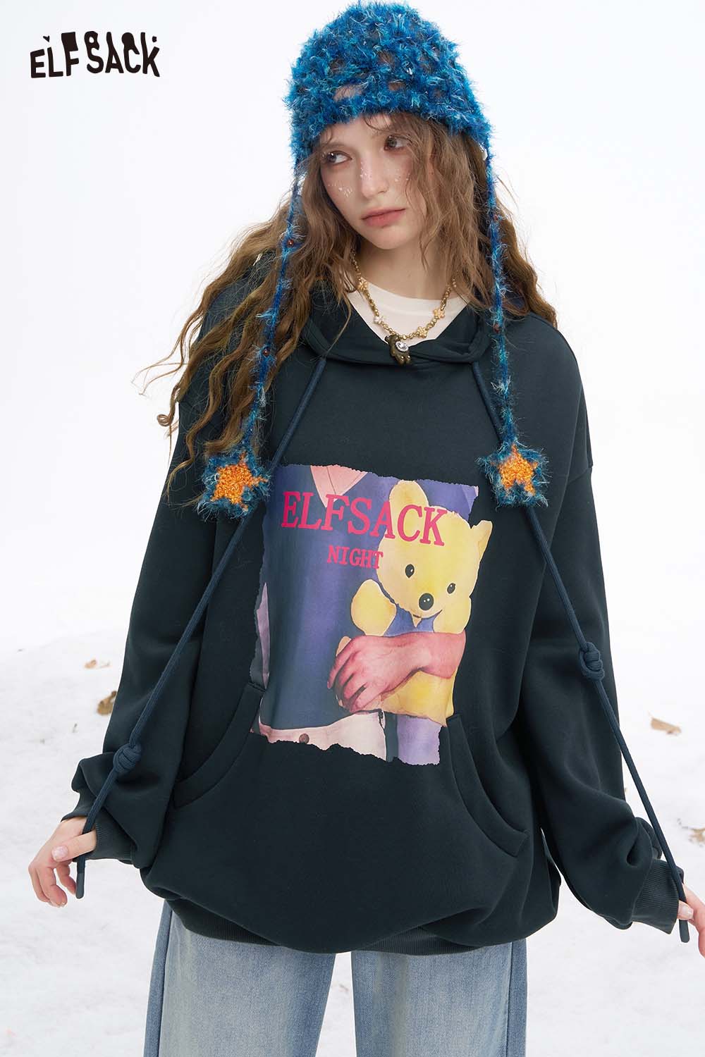 ELFSACK women's animal graphic hoodie featuring a cozy design with a colorful bear print