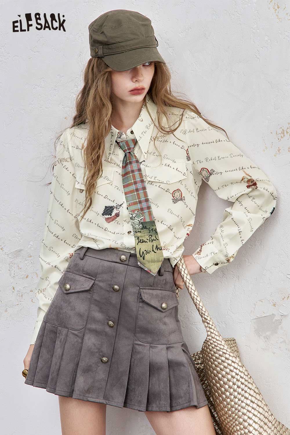 ELFSACK women's printed shoulder shirt styled with a plaid tie and a grey suede skirt
