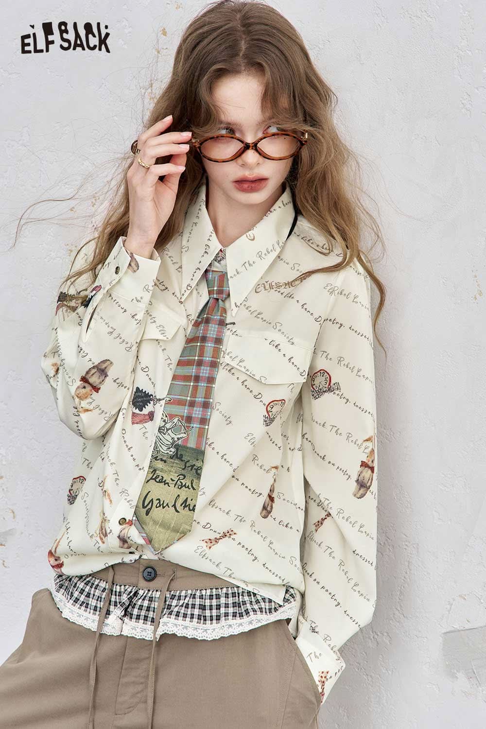 ELFSACK women's printed shoulder shirt featuring a unique design with playful patterns and elegant style