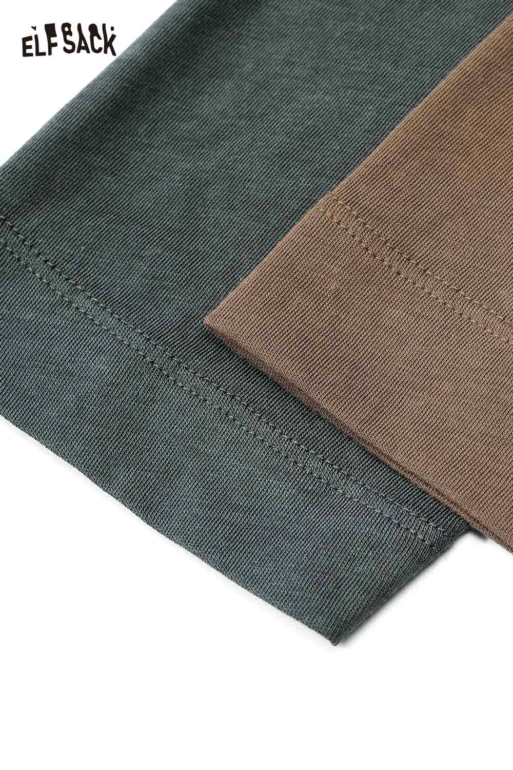 Close-up of ELFSACK women's raglan sleeve graphic tee fabric showcasing color details and stitching