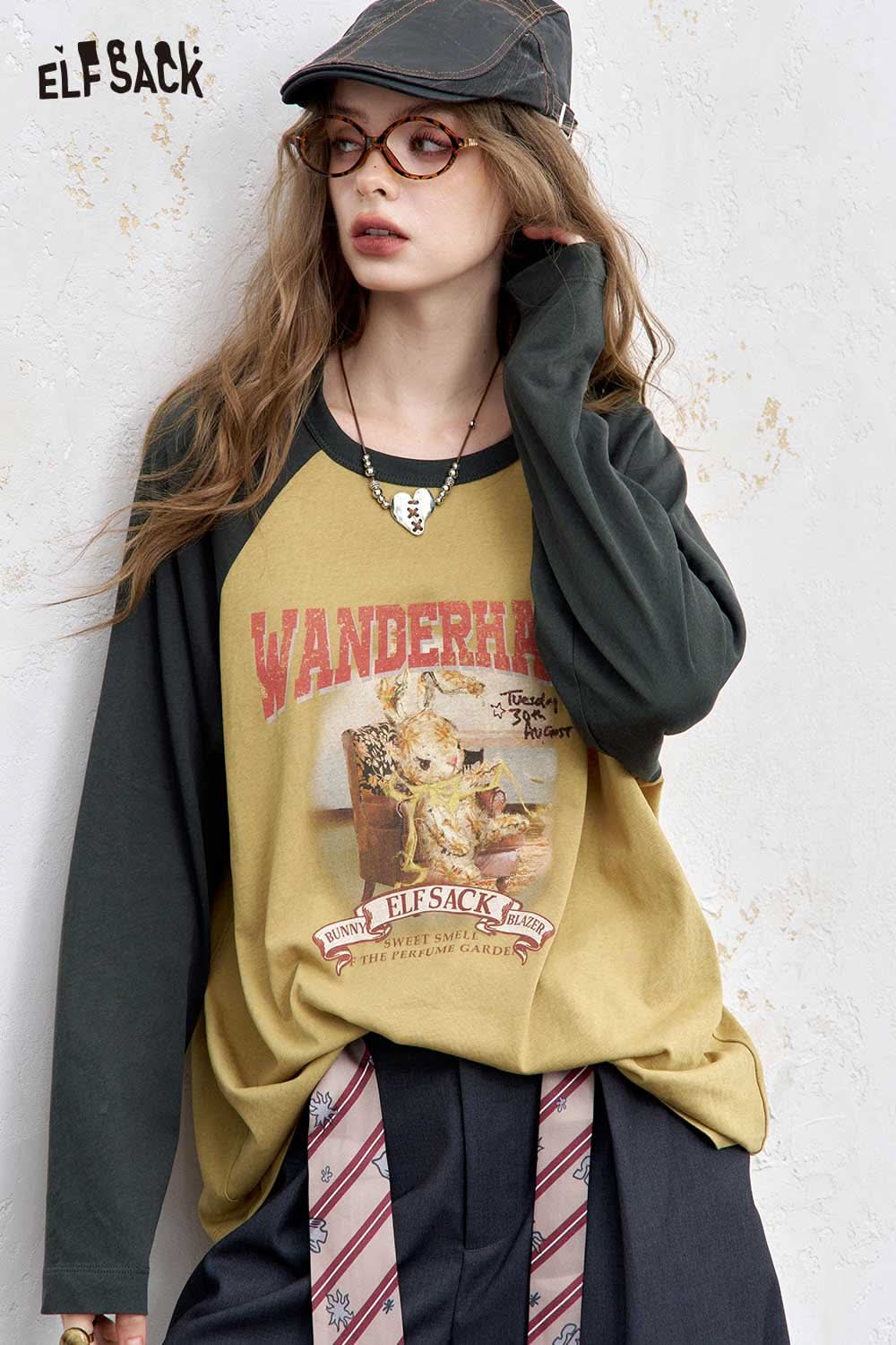 ELFSACK women's raglan sleeve graphic tee in yellow and green with trendy Wanderlust design