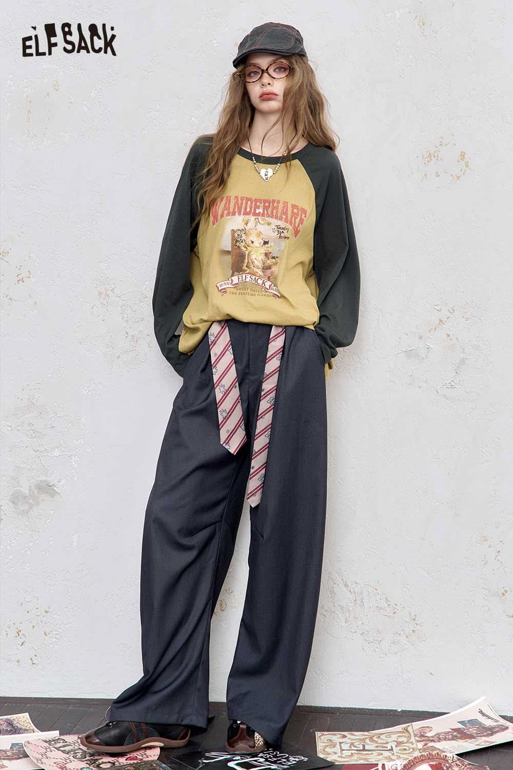 ELFSACK women's raglan sleeve graphic tee in yellow and green with a vintage wanderlust design