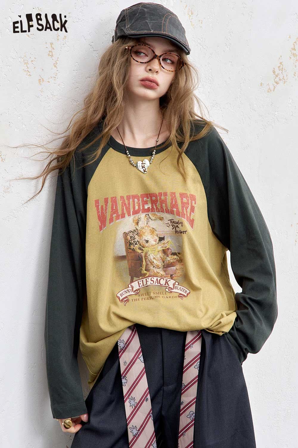 ELFSACK women's raglan sleeve graphic tee in green and beige featuring a retro design