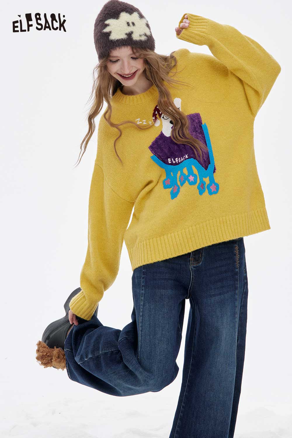 Women's sleeping dog graphic sweater in yellow by ELFSACK featuring a playful design and relaxed fit