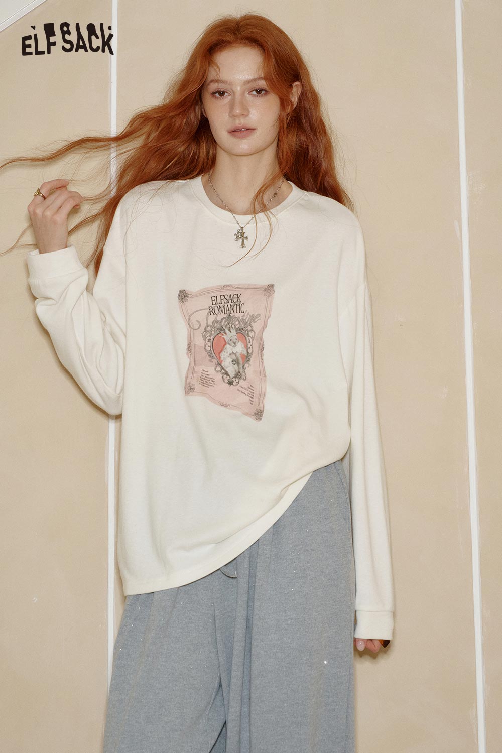 ELFSACK women's graphic print t-shirt in cream with unique front design and relaxed fit