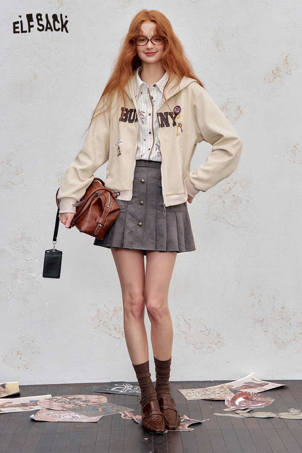 ELFSACK embroidered hooded sweatshirt for women styled with a gray skirt for a trendy look
