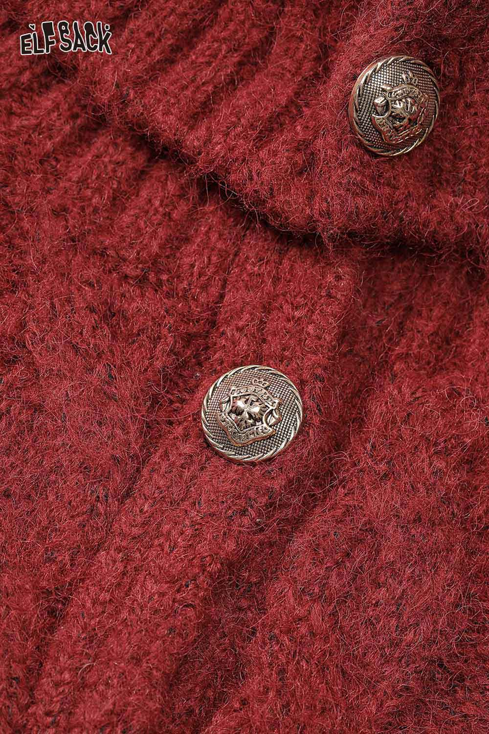 Close-up of ELFSACK embroidered knit maxi dress featuring textured fabric and decorative buttons