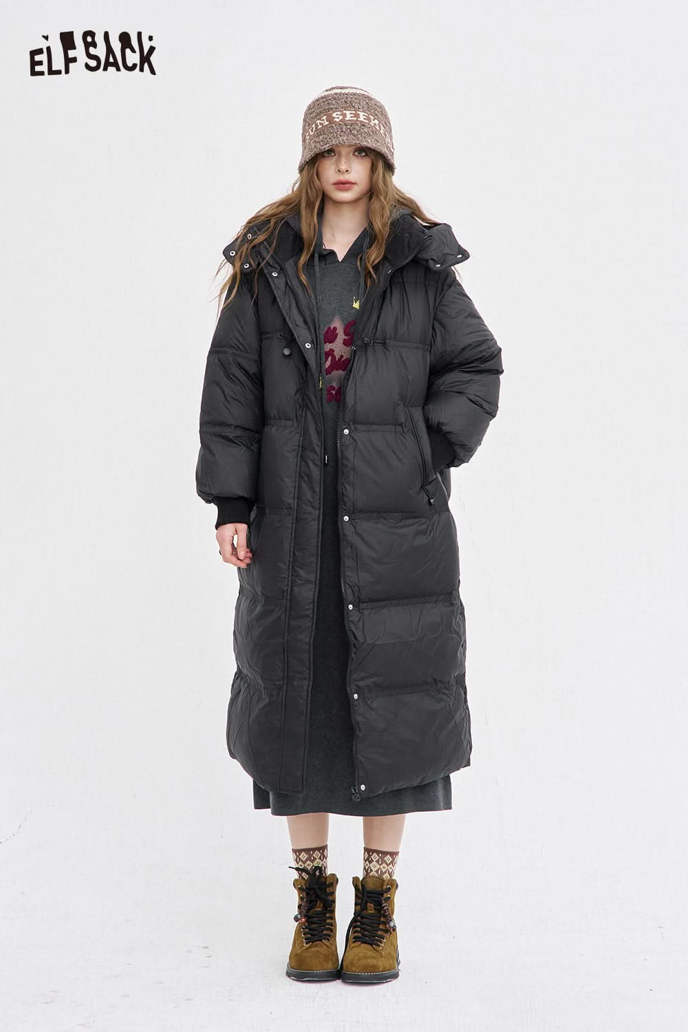 ELFSACK Embroidered long dress for women layered under a black puffer coat with a stylish hat