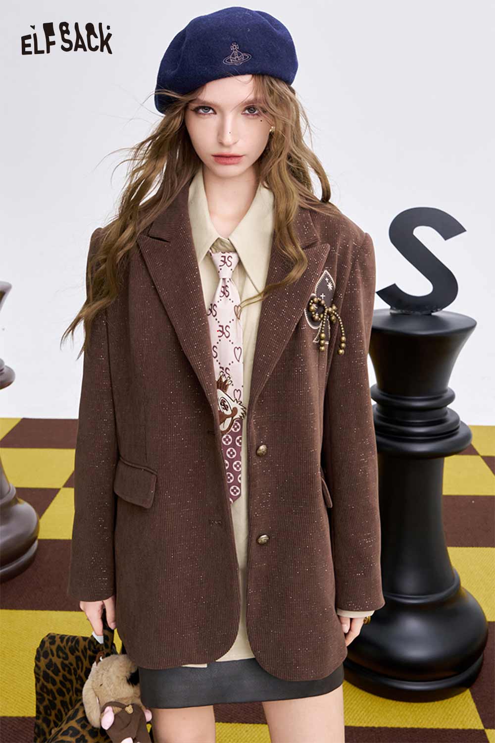 Chic ELFSACK embroidered solid color shirt for women layered under a brown blazer