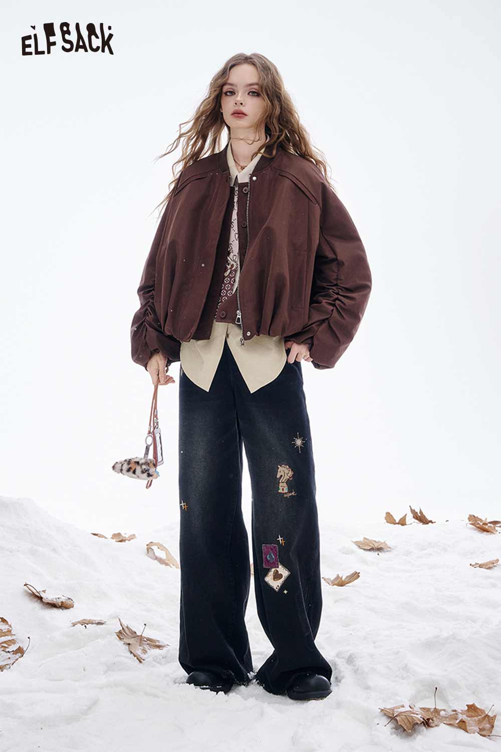 ELFSACK embroidered solid color shirt for women layered under a stylish brown jacket in a winter setting