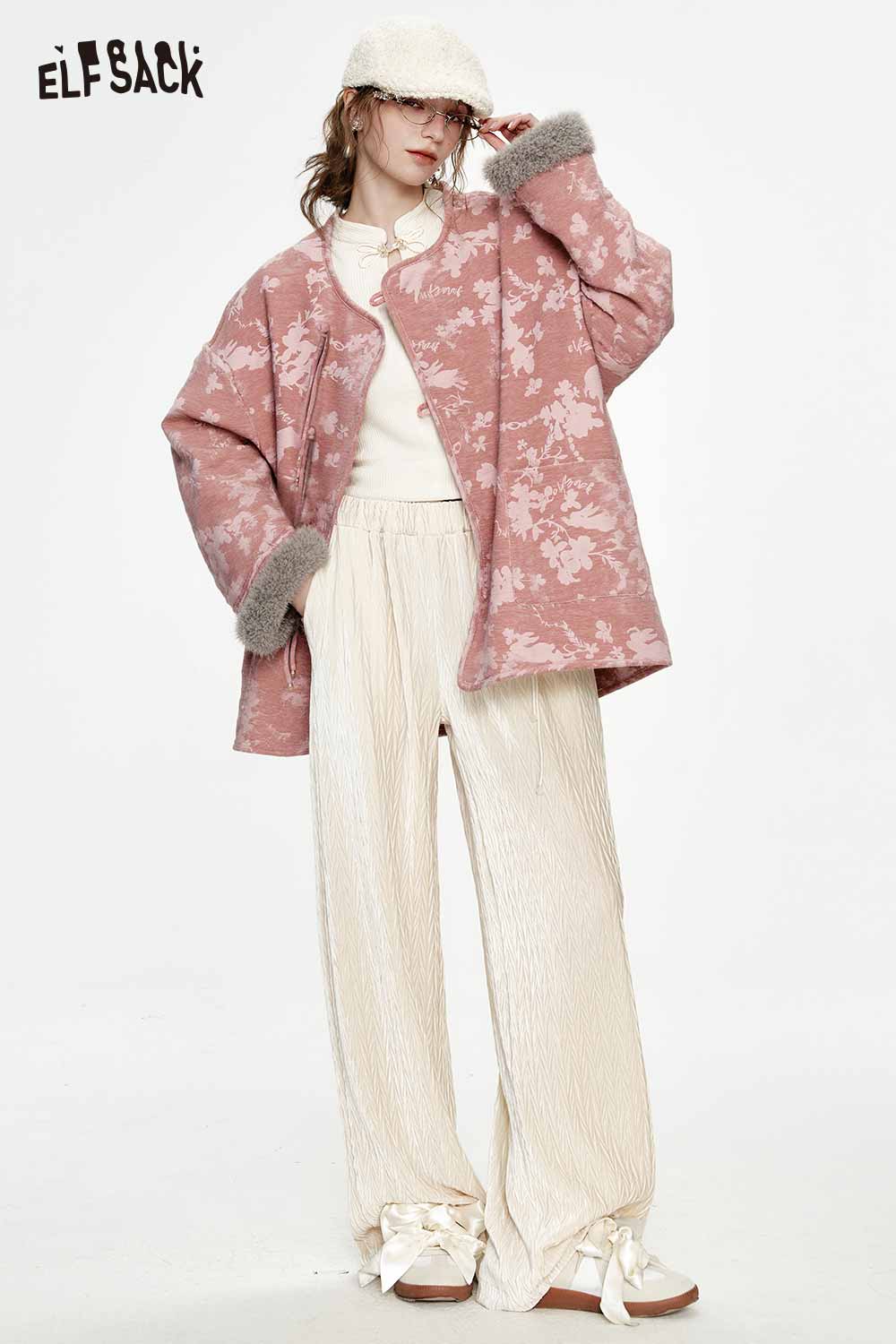 ELFSACK ethnic print plush trim coat in pink paired with cream pleated pants for a stylish look