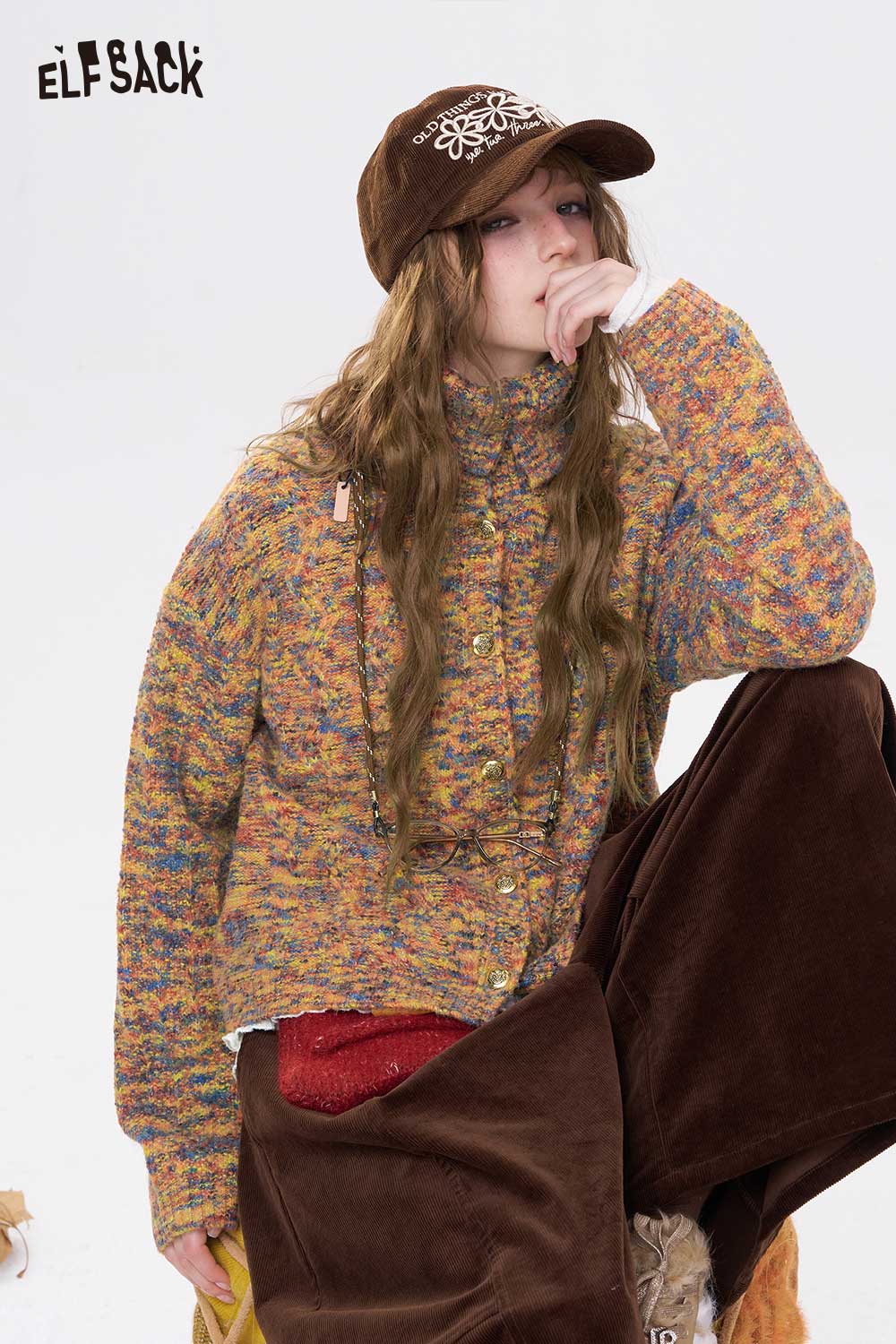 ELFSACK cropped high neck sweater for women in colorful knit design, paired with a brown cap