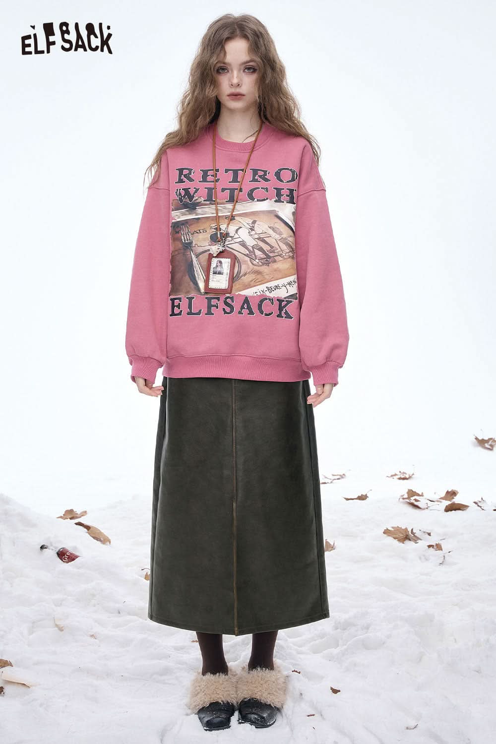 ELFSACK faux leather maxi skirt styled with a pink retro sweatshirt for a trendy winter look