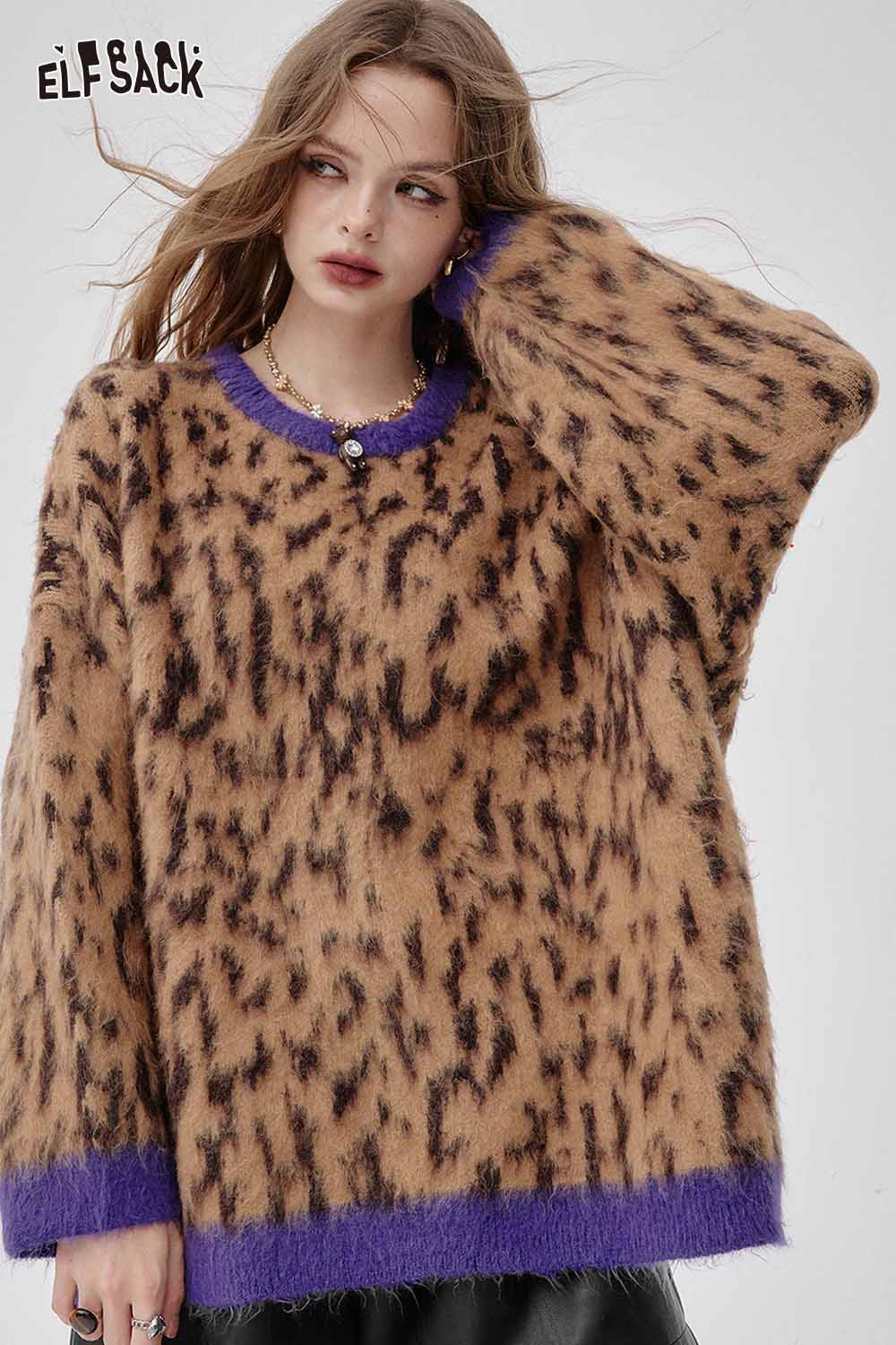 ELFSACK Women's oversized sweater in animal print with purple trim, styled with faux leather shorts for women