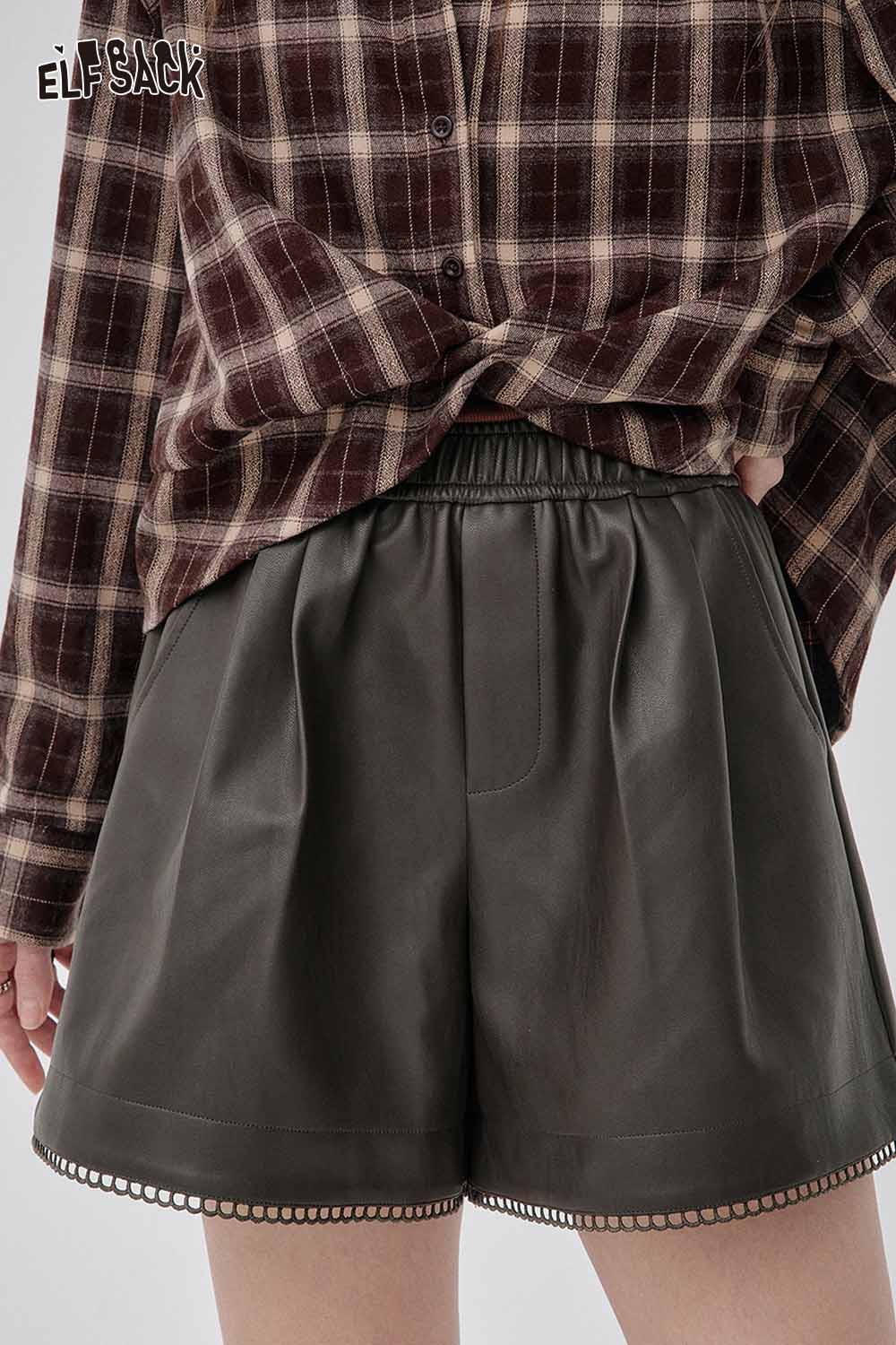 ELFSACK stylish faux leather shorts for women with a relaxed fit and decorative hem detail