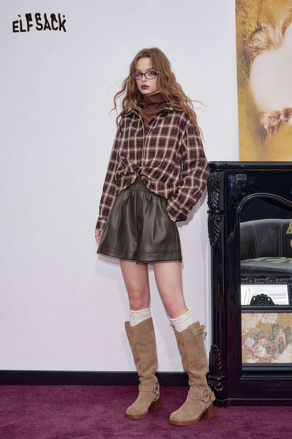 ELFSACK faux leather shorts for women styled with a plaid top and knee-high boots