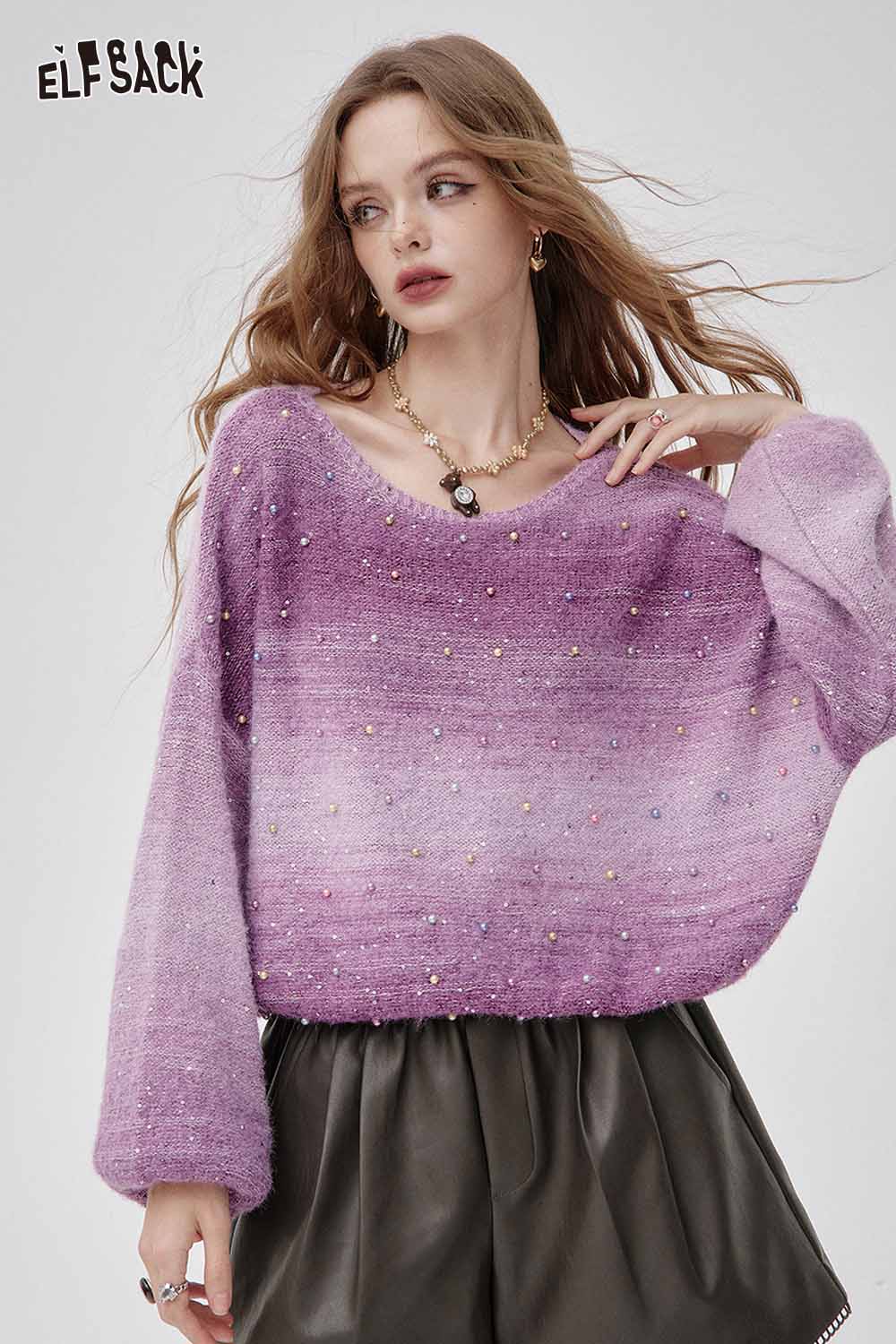 ELFSACK women's faux leather shorts for women paired with a stylish purple sweater and layered accessories