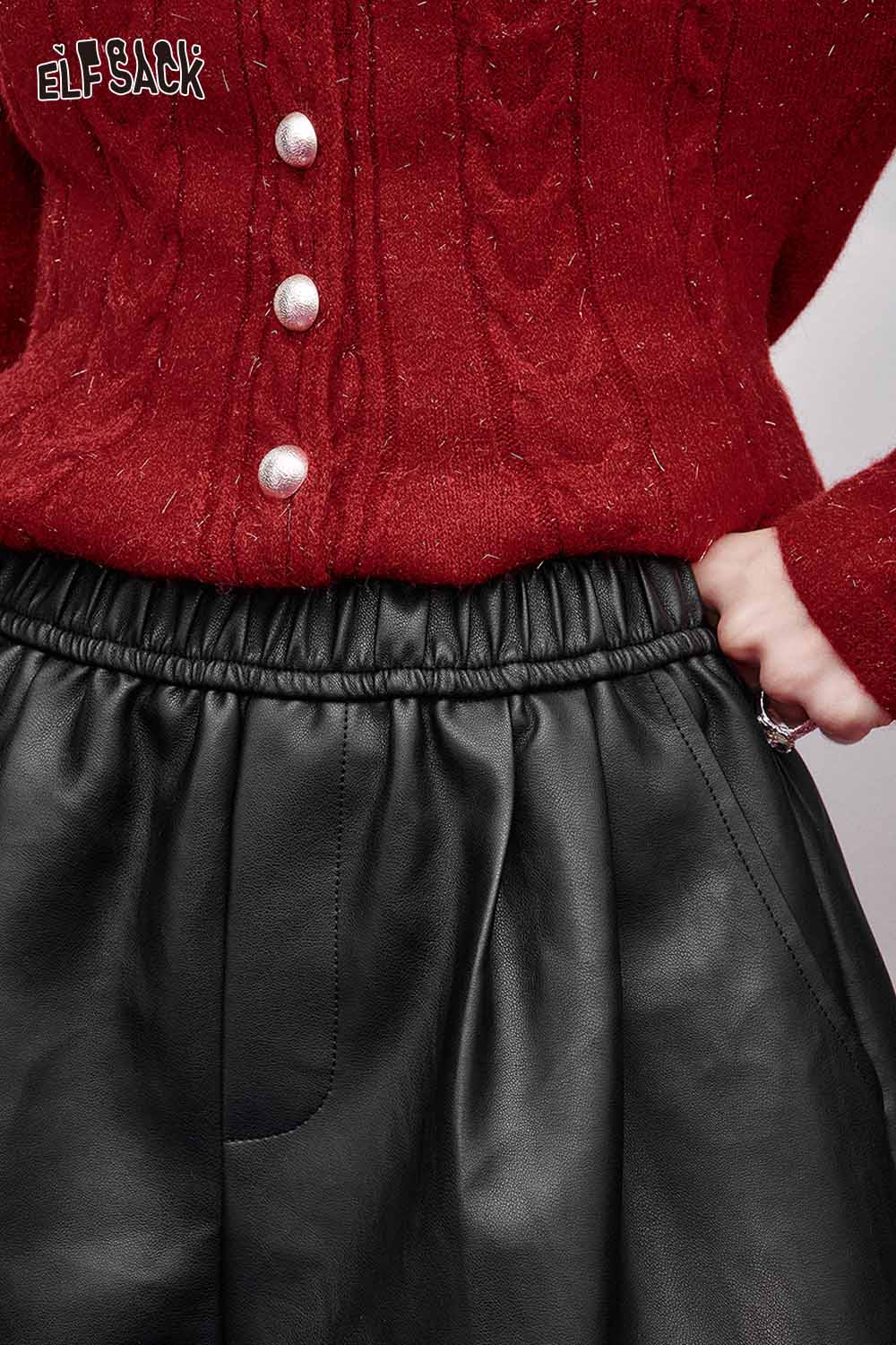 ELFSACK faux leather shorts for women with an elastic waistband, styled with a red sweater