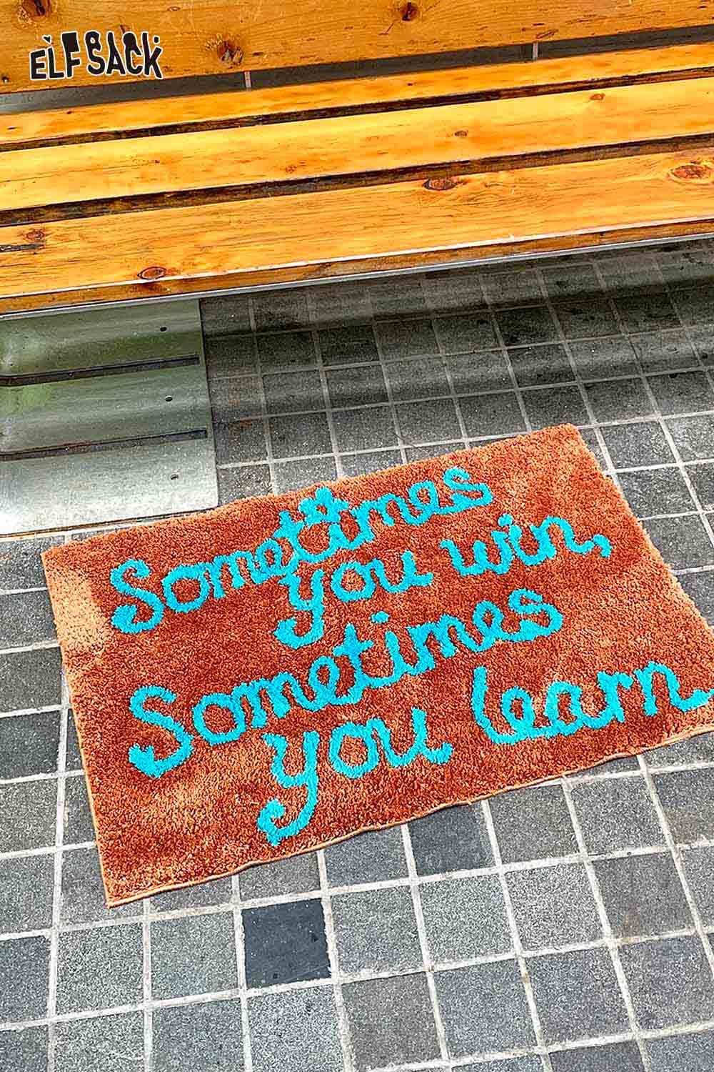ELFSACK felted wool rug with typography featuring the phrase Sometimes You win, Sometimes You learn