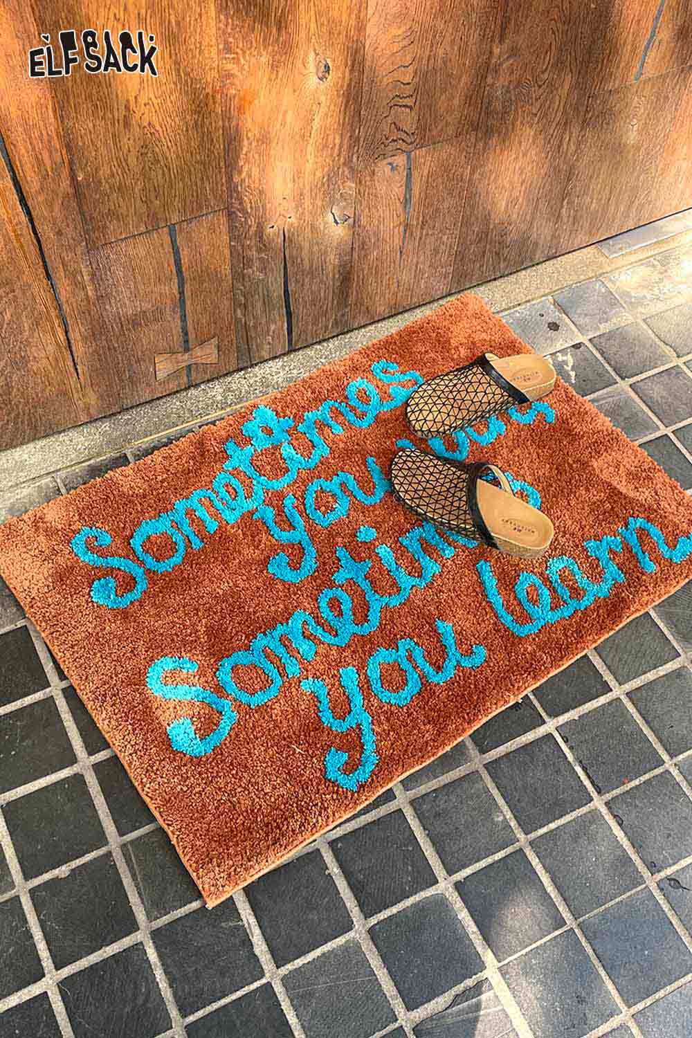 ELFSACK felted wool rug with typography featuring a motivational quote in vibrant colors