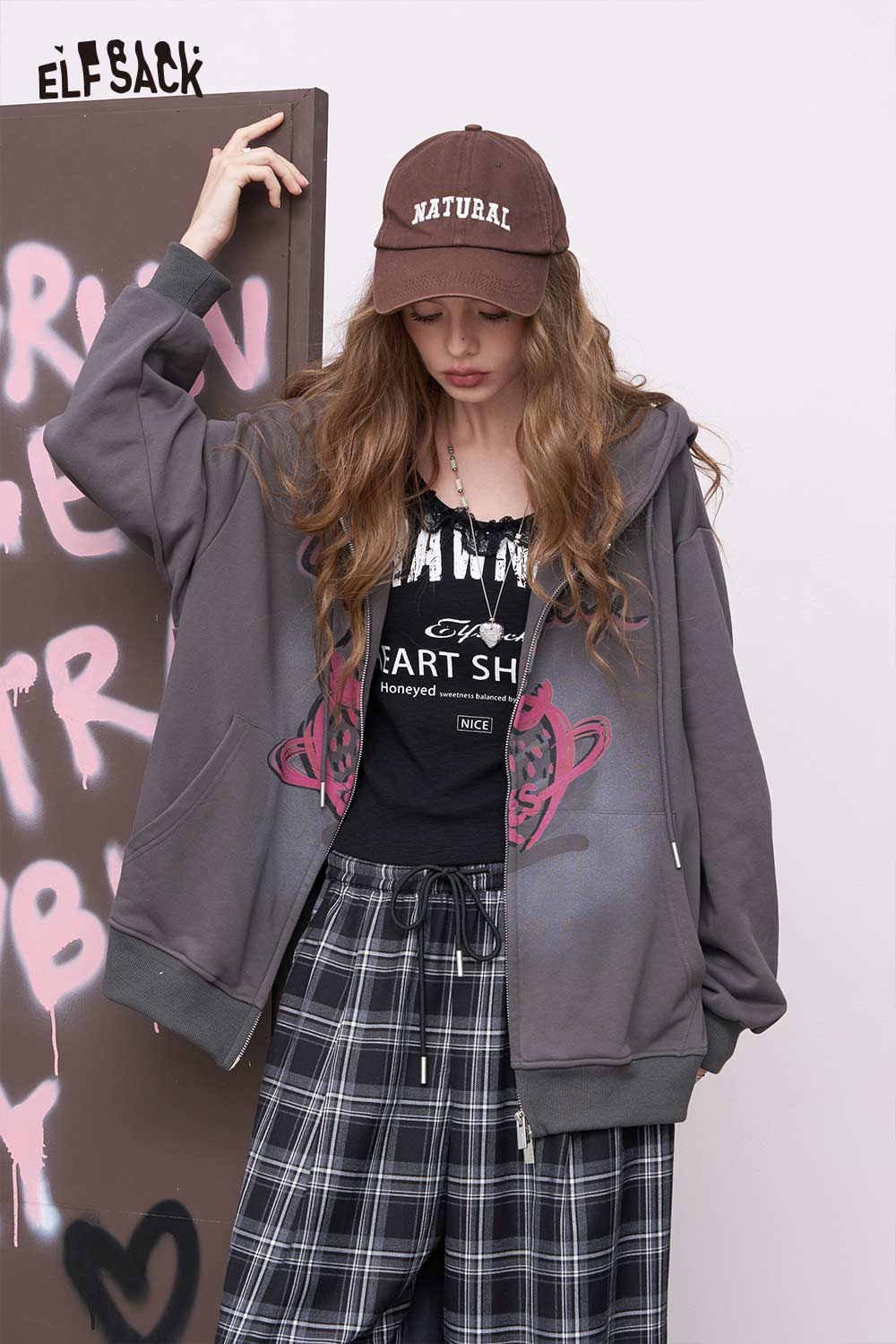 ELFSACK model wearing lace patchwork camisole for women layered under gray zip hoodie and plaid pants