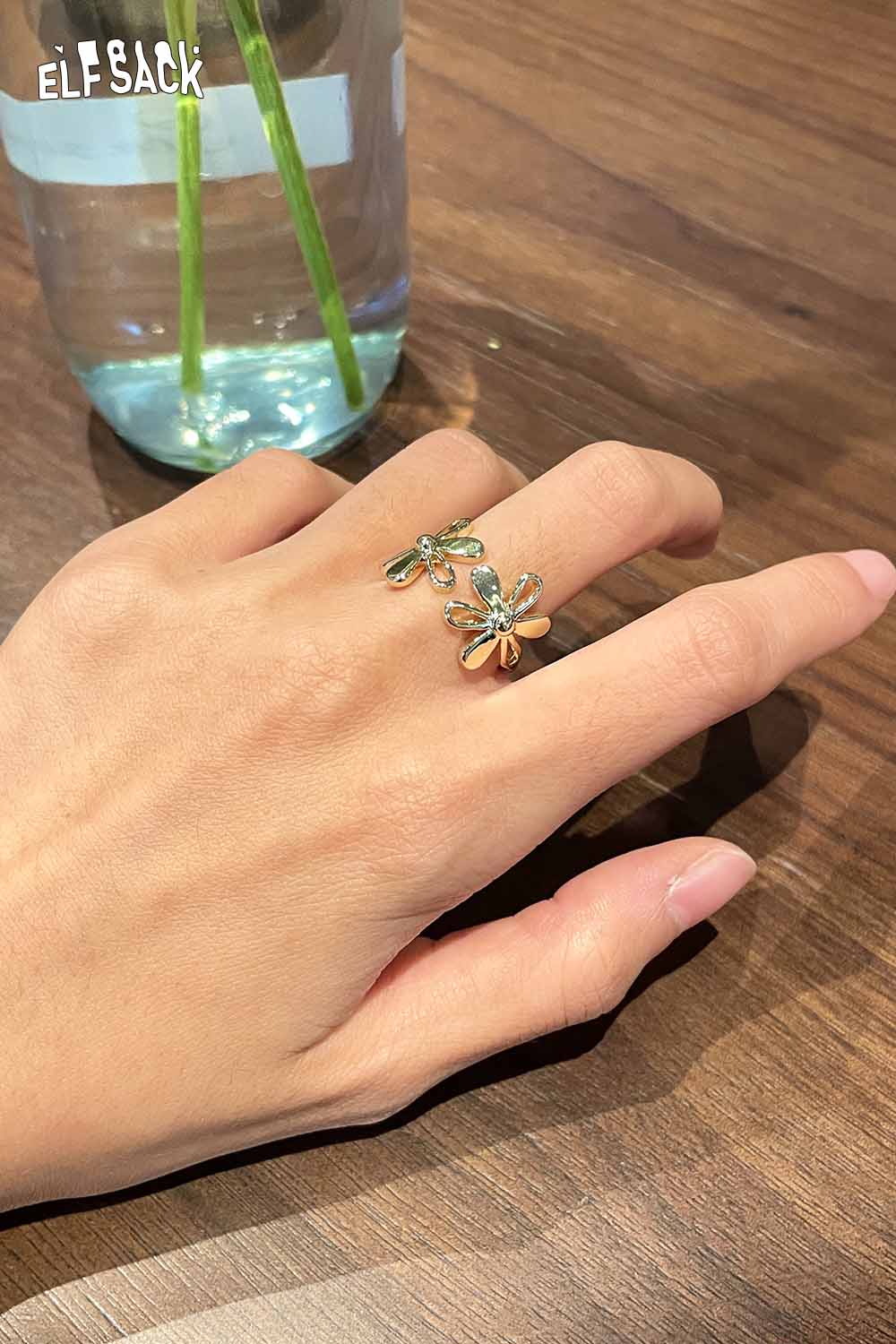 Floral copper statement ring featuring delicate flower designs for stylish accessorizing