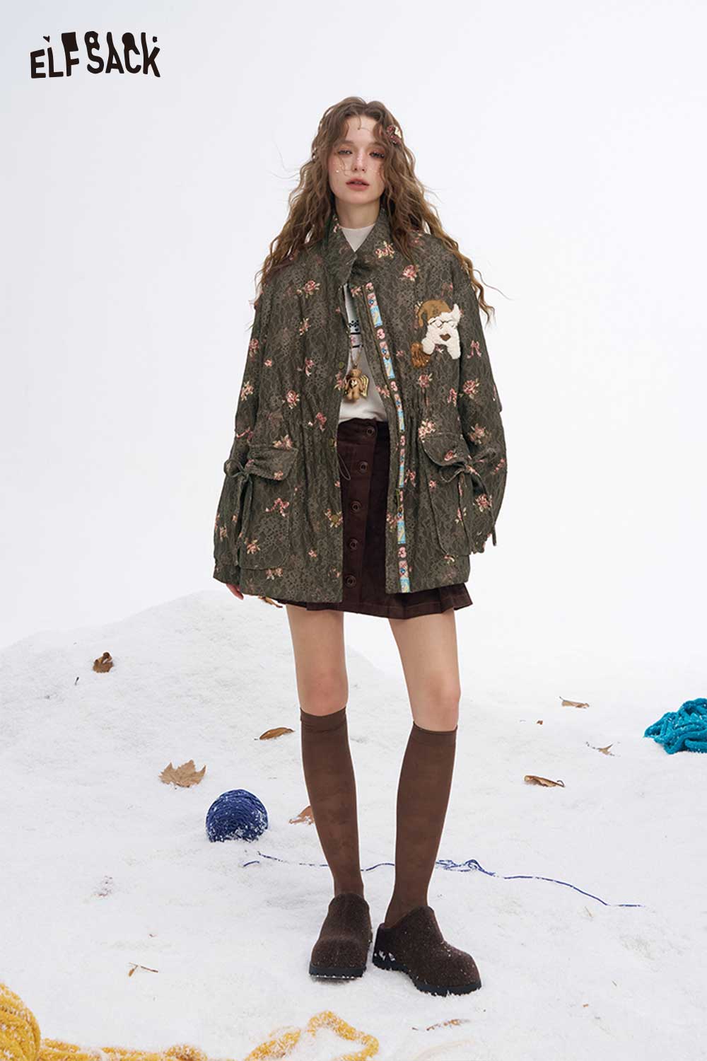 ELFSACK floral dog graphic coat featuring playful designs and a relaxed fit for stylish cold weather wear