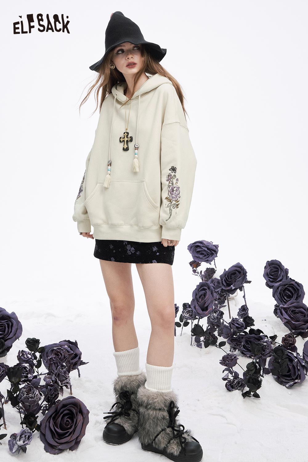 ELFSACK floral graphic tassel hoodie for women featuring a stylish design with floral accents and tassels