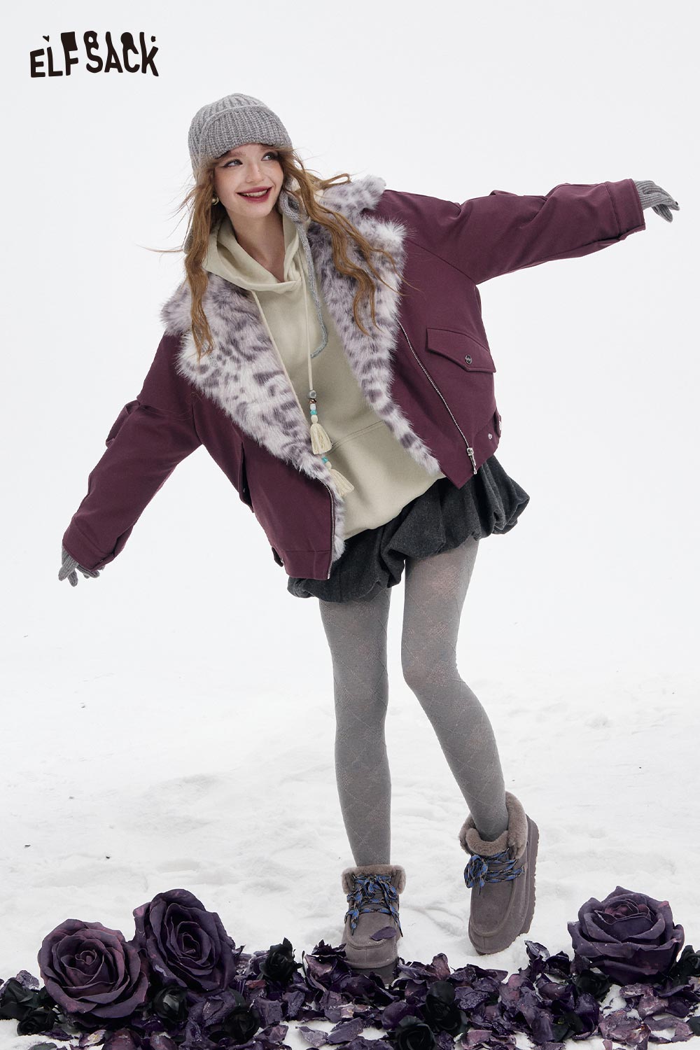 ELFSACK floral graphic tassel hoodie for women styled with a stylish fur jacket and skirt