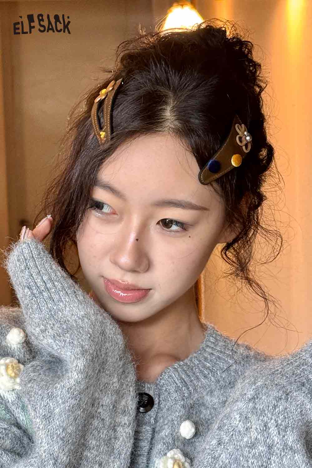 ELFSACK floral hair clip accessory in unique design adding charm to styled hair