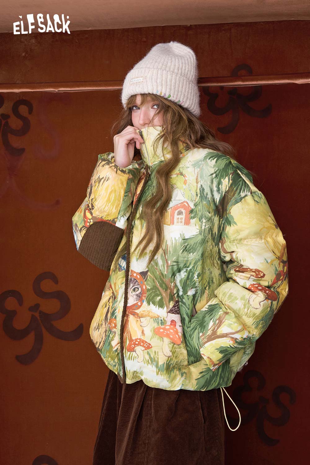 ELFSACK forest animal graphic down jacket featuring colorful woodland prints and a cozy fit