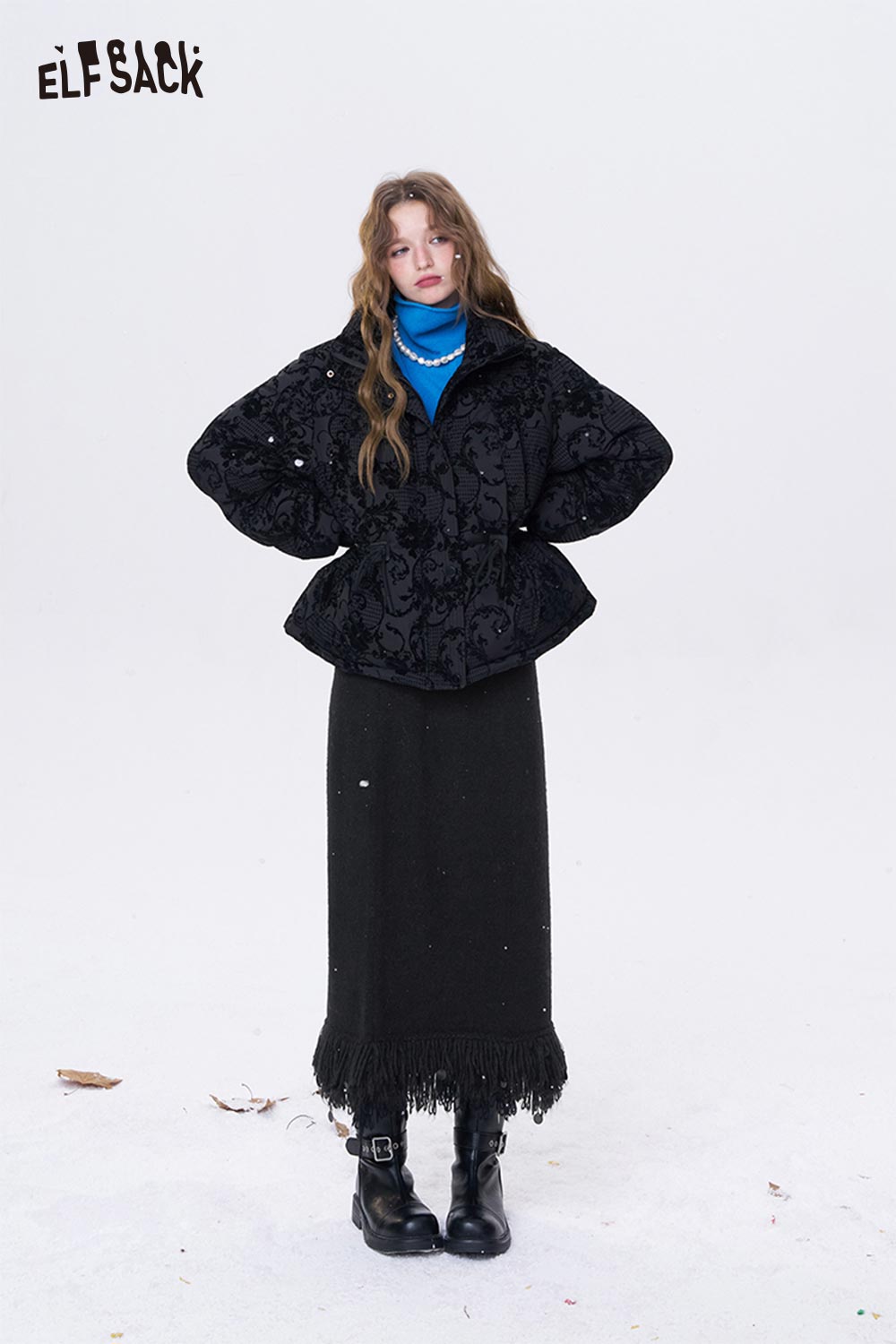 ELFSACK fringe hem long skirt in black paired with a stylish jacket for a trendy winter look