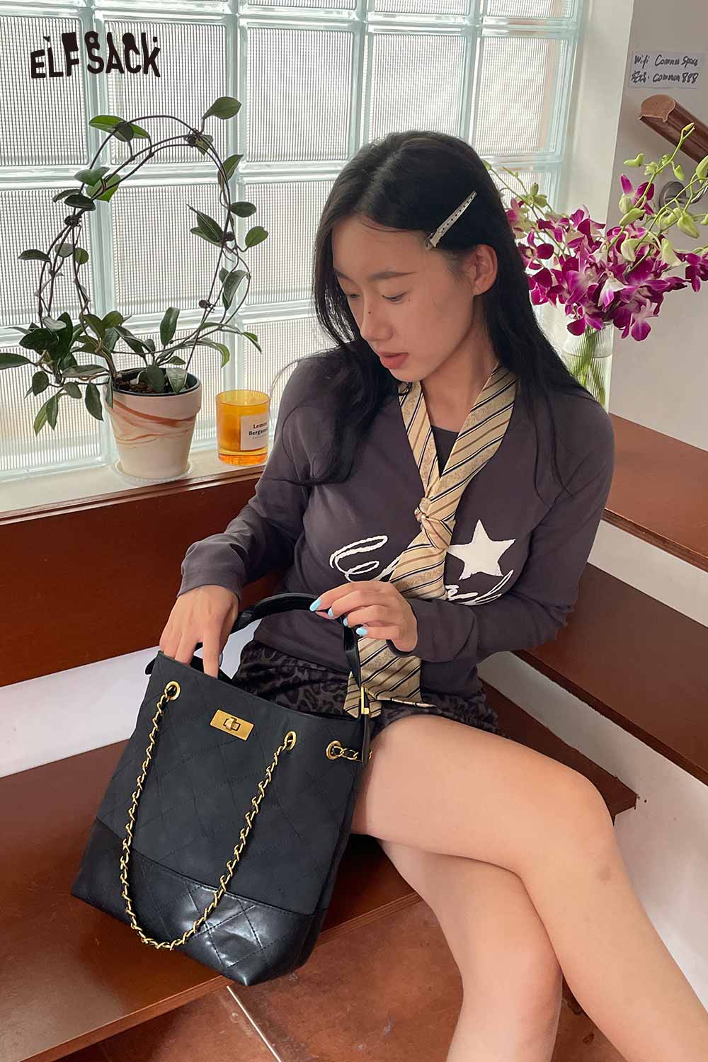 ELFSACK genuine leather bucket bag with quilted design and gold chain strap for stylish everyday use
