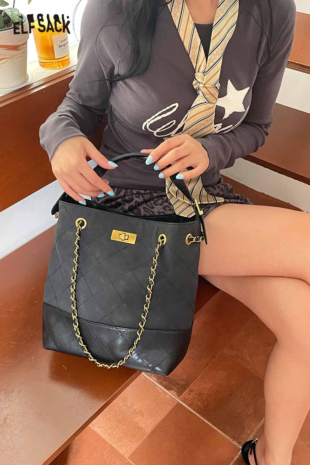 ELFSACK genuine leather bucket bag with quilted design and gold chain handle for stylish everyday use