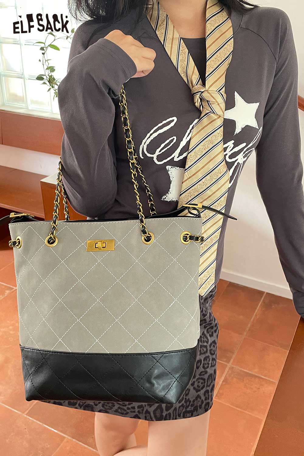 ELFSACK stylish genuine leather bucket bag with chain straps and a chic design for everyday use