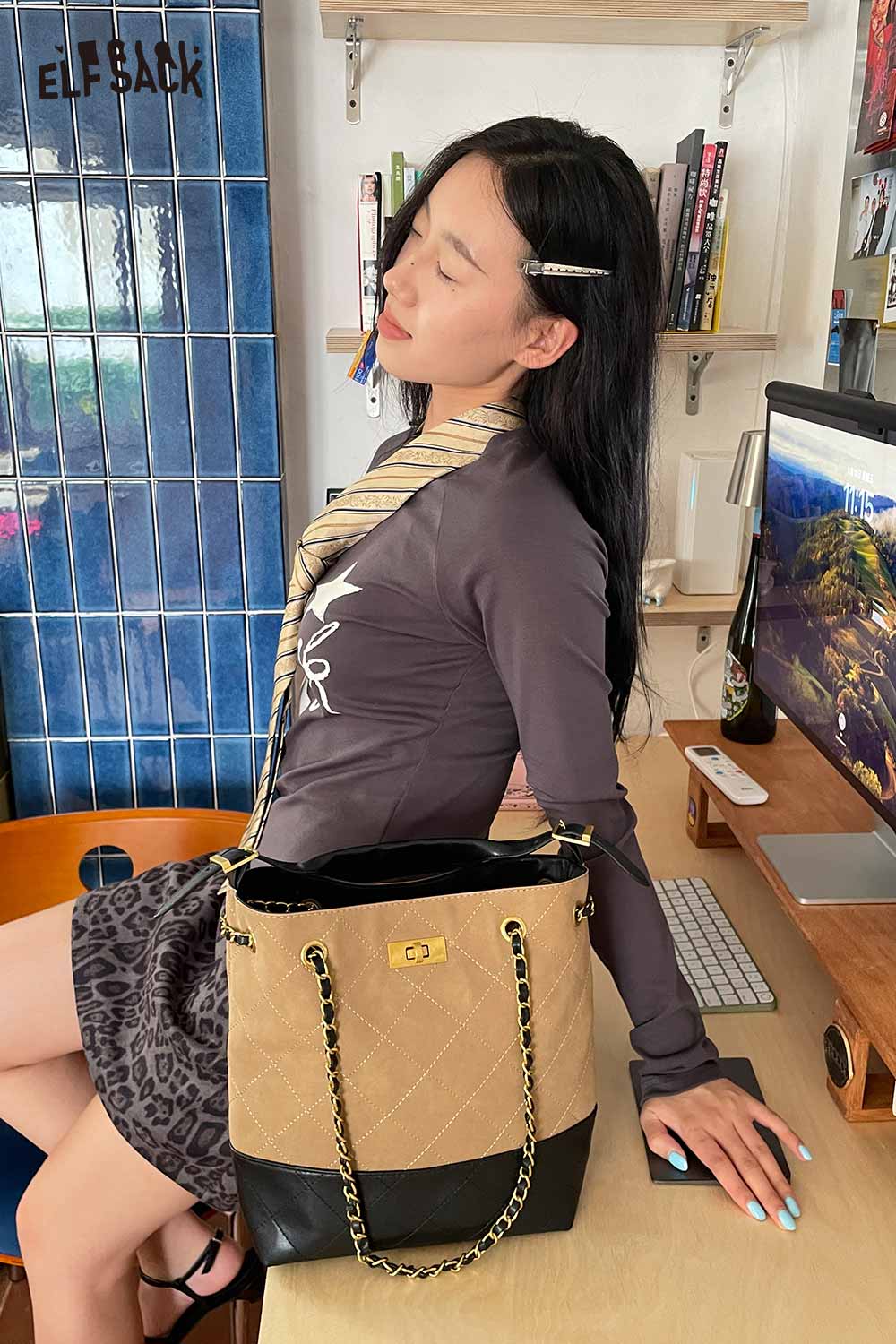 ELFSACK genuine leather bucket bag featuring a stylish design suitable for any outfit