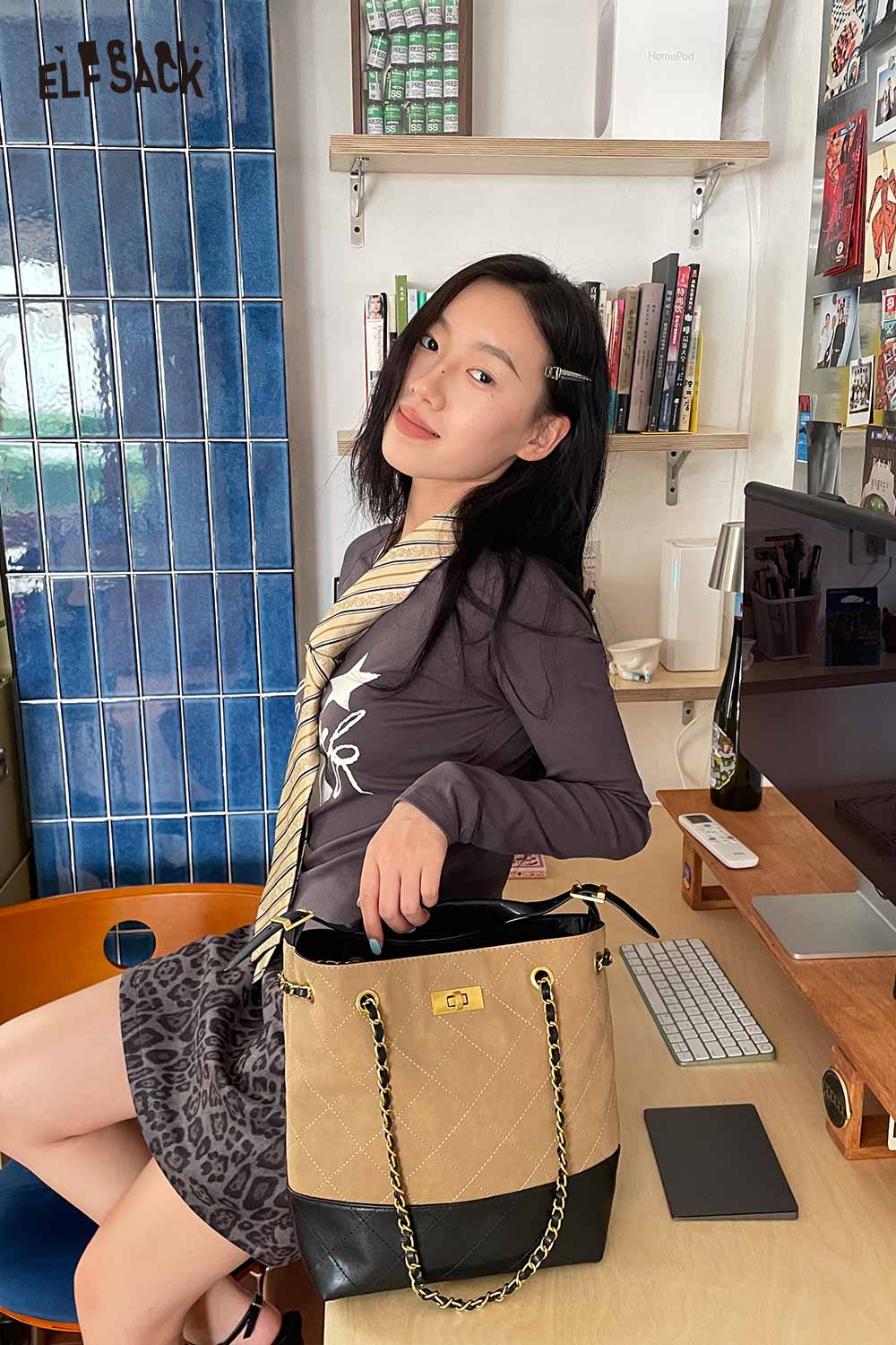 ELFSACK genuine leather bucket bag with stylish quilted design and chain straps