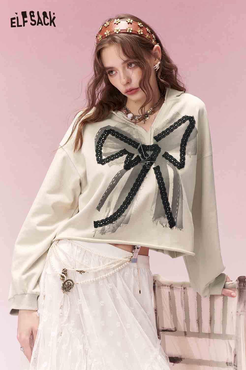 ELFSACK girly lace bow cropped sweatshirt in light beige with oversized bow design for a trendy look