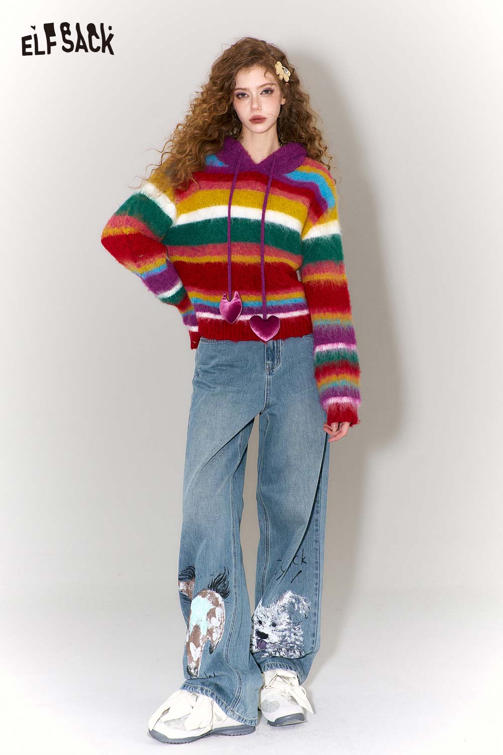 ELFSACK graffiti animal print wide leg jeans styled with a colorful striped hoodie for a trendy look