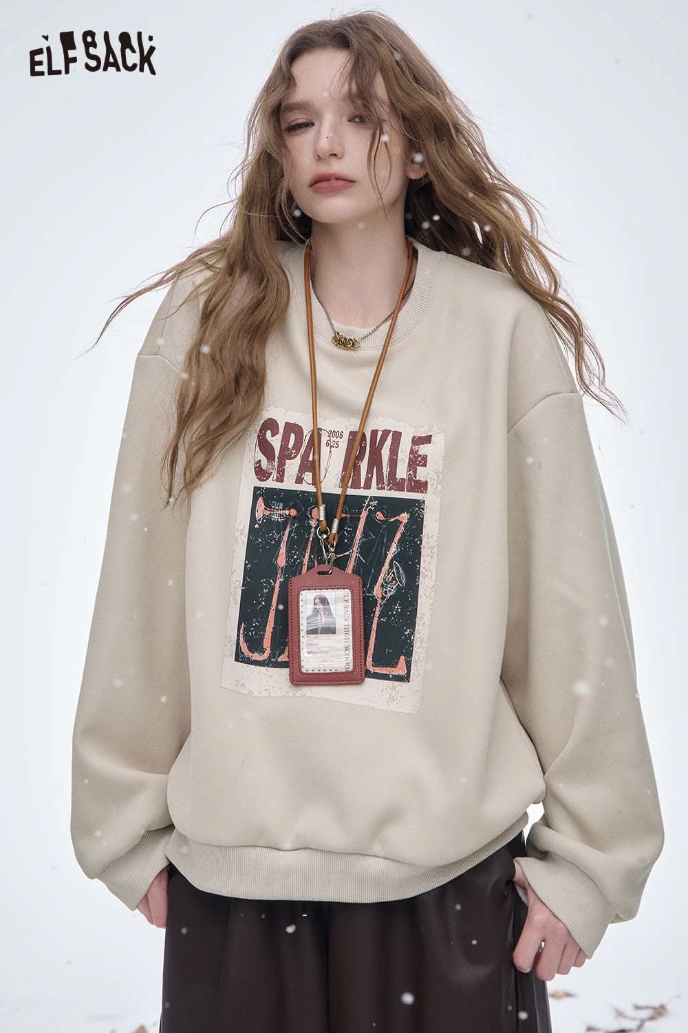 ELFSACK women's graphic sweatshirt in beige with a bold sparkle print for a trendy casual look