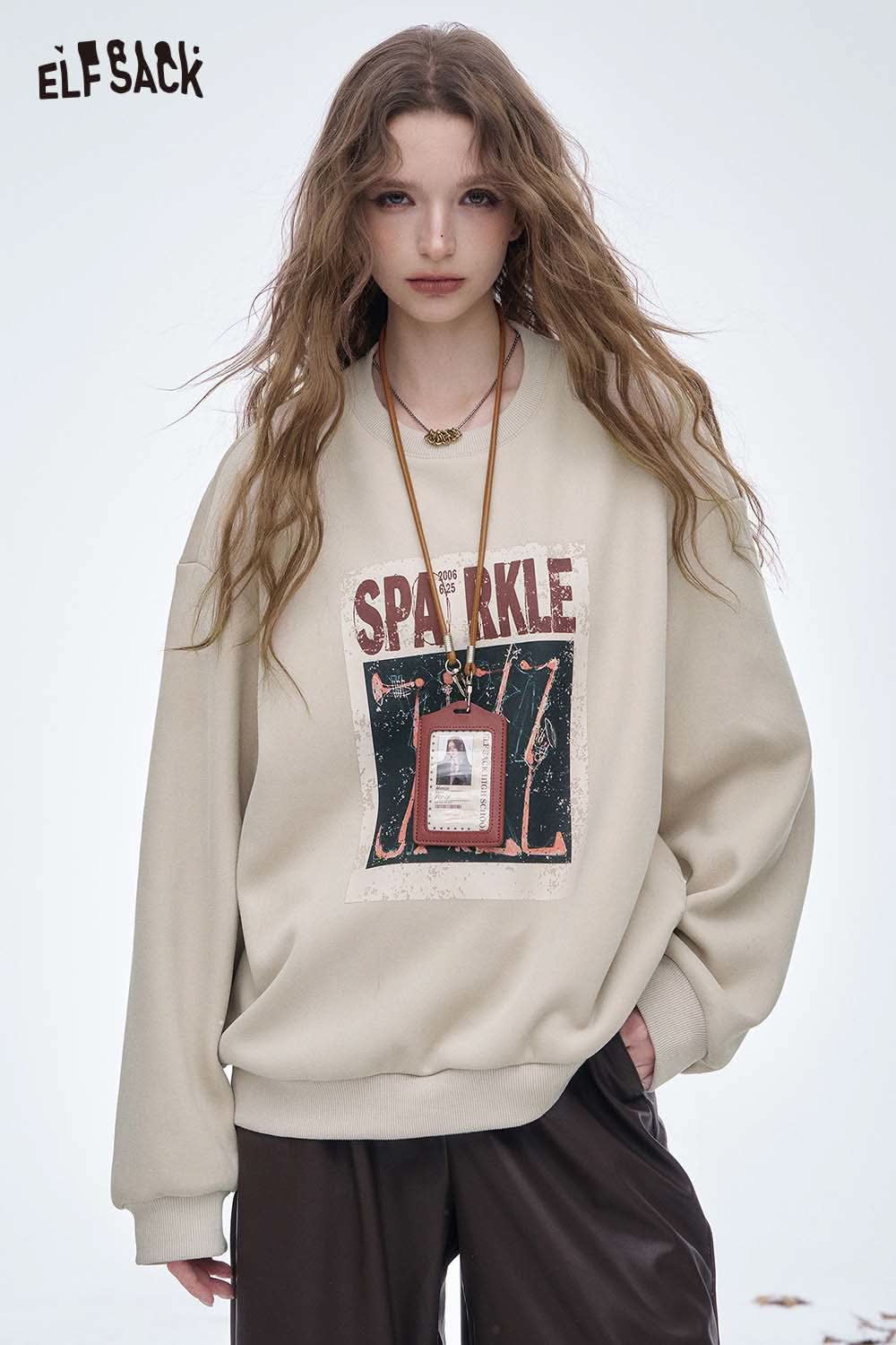 ELFSACK women's graphic sweatshirt in beige with a sparkly print design for a trendy casual look