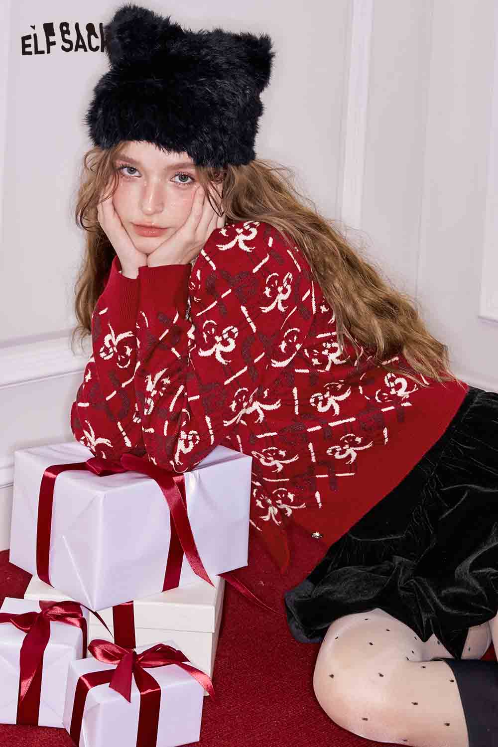 Red ELFSACK heart bow print cardigan with playful design for cozy winter styling