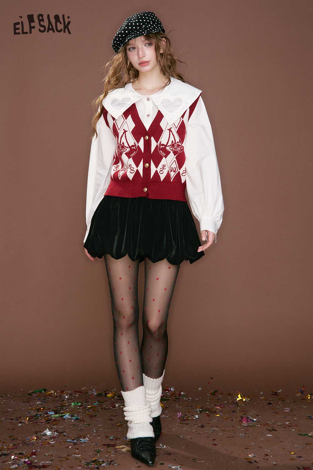 ELFSACK heart collar blouse for women styled with a red vest and a playful black skirt