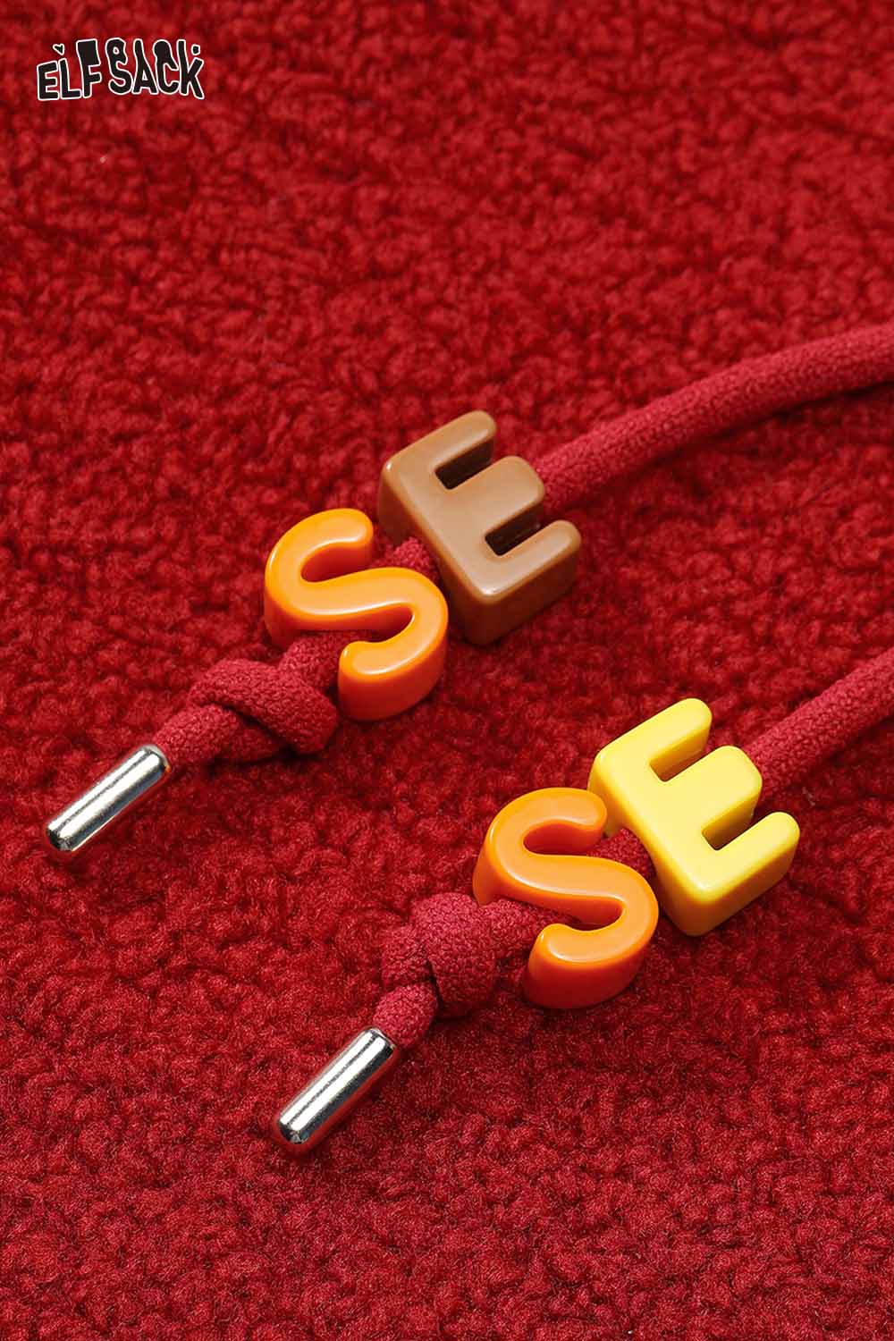 
                  
                    ELFSACK Heart Embroidery Cropped Hoodie with Colorful Decorative Drawstring Details
                  
                